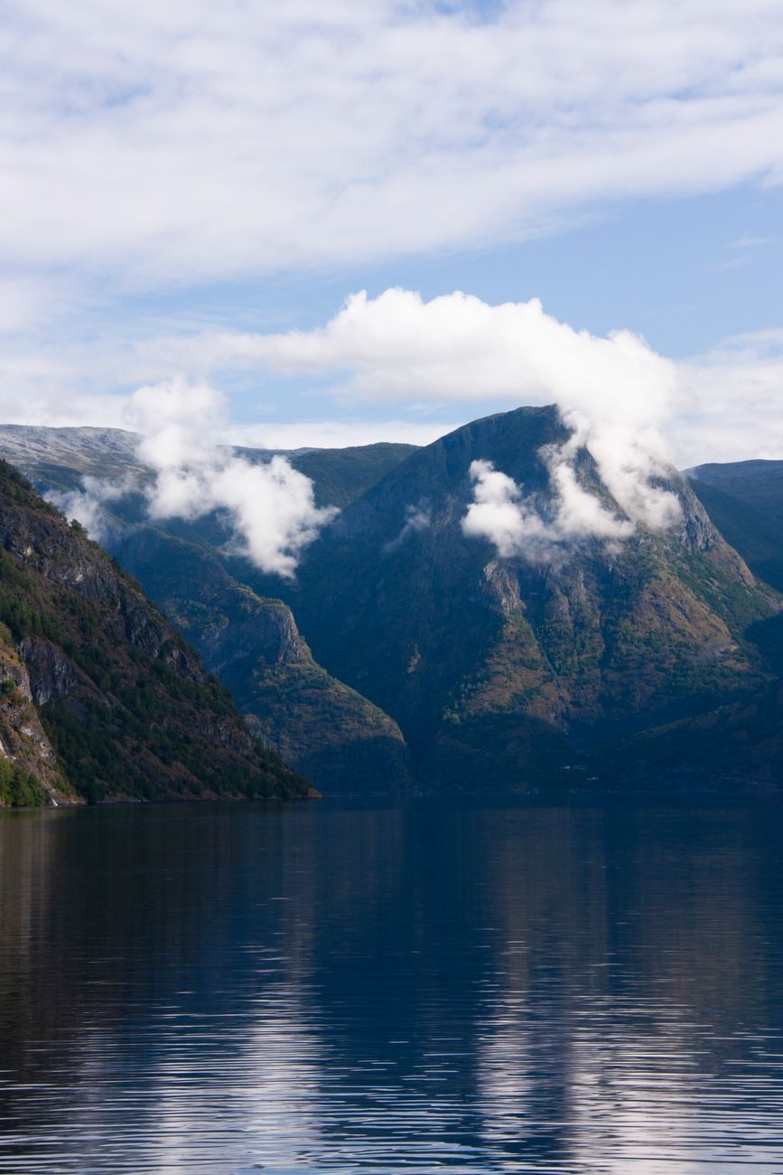 Atmospheric fjord waters reflected in low mist